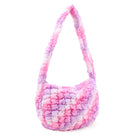 side view of a pink and purple ombre colored quilted nylon hobo style crossbody sling bag