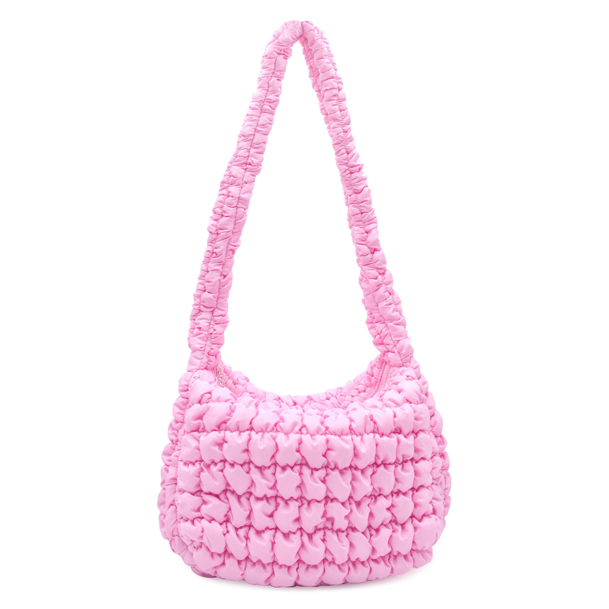 Front view of a bright pink quilted nylon large sling bag 