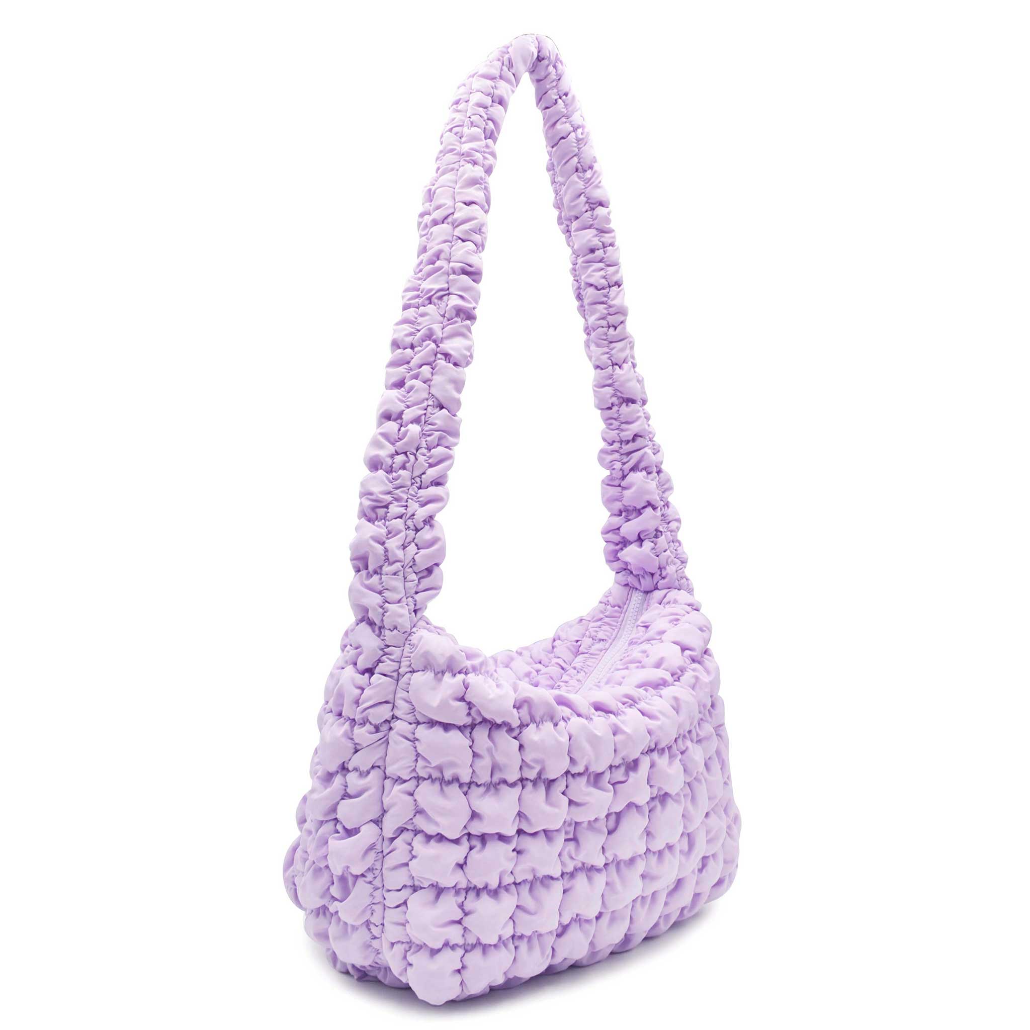 side view of a lavender quilted nylon large hobo style sling bag