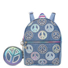 Front view of a denim mini backpack with metallic peace sign patches  anda detachable peace sign round coin purse