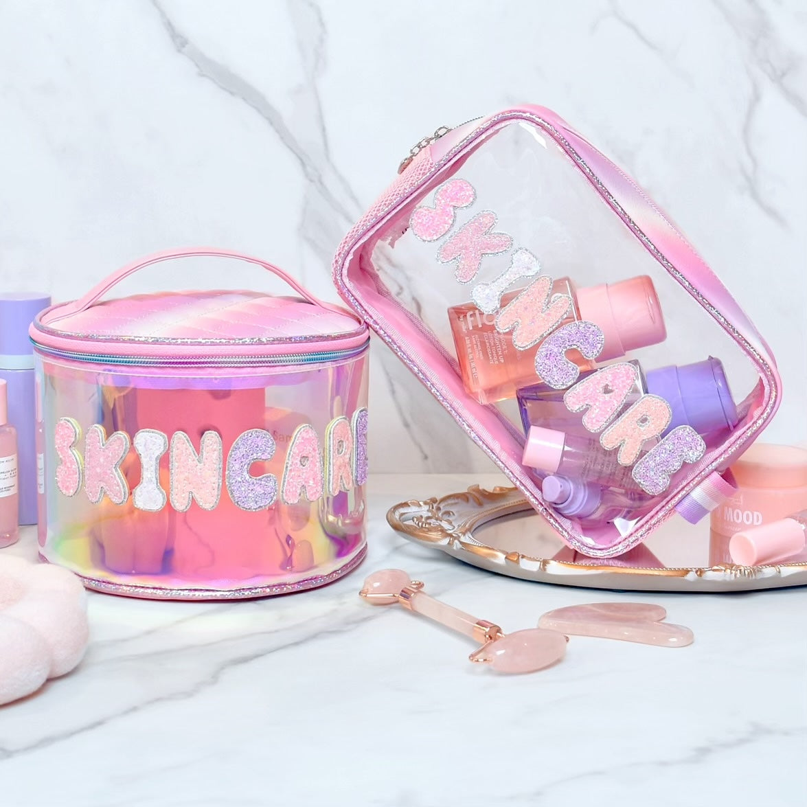 photoshoot photo of a glazed clear rounded train case with bubble lettering 'skincare' glitter appliqués