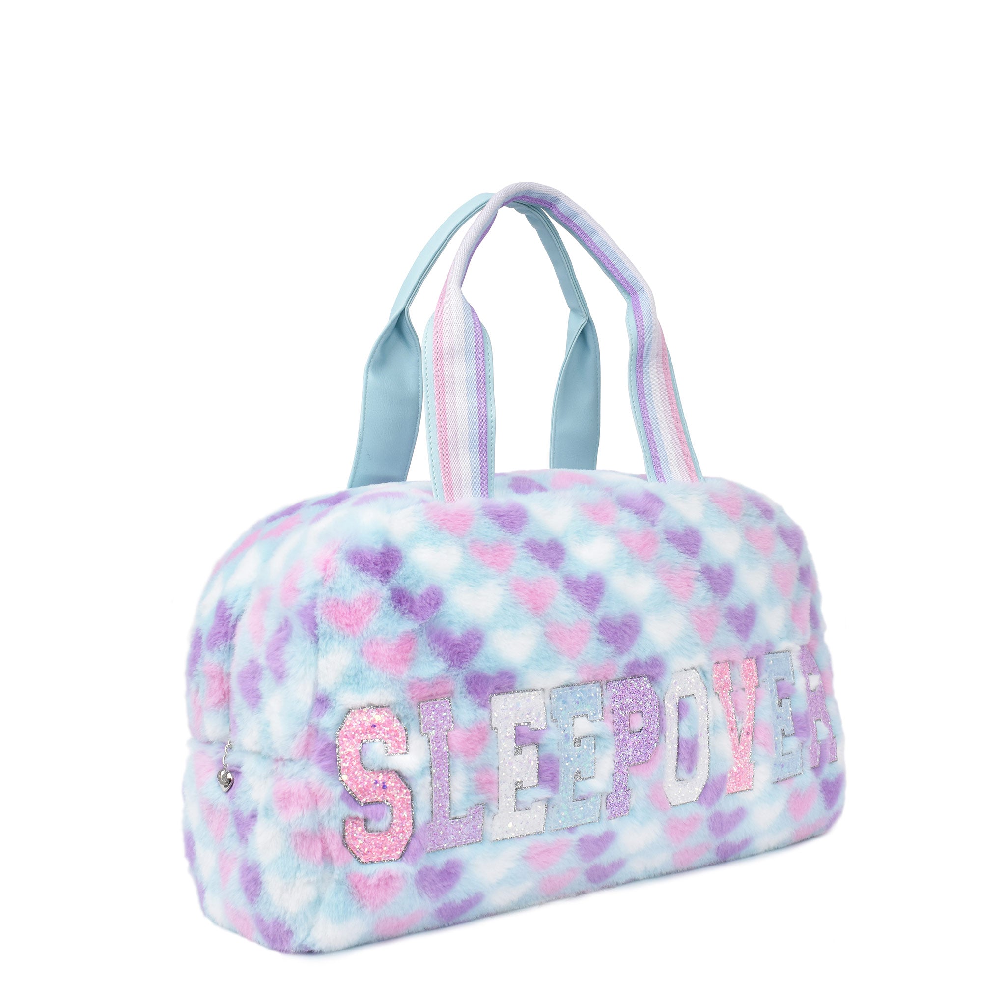 Side view of a heart-printed plush medium duffle bag 
