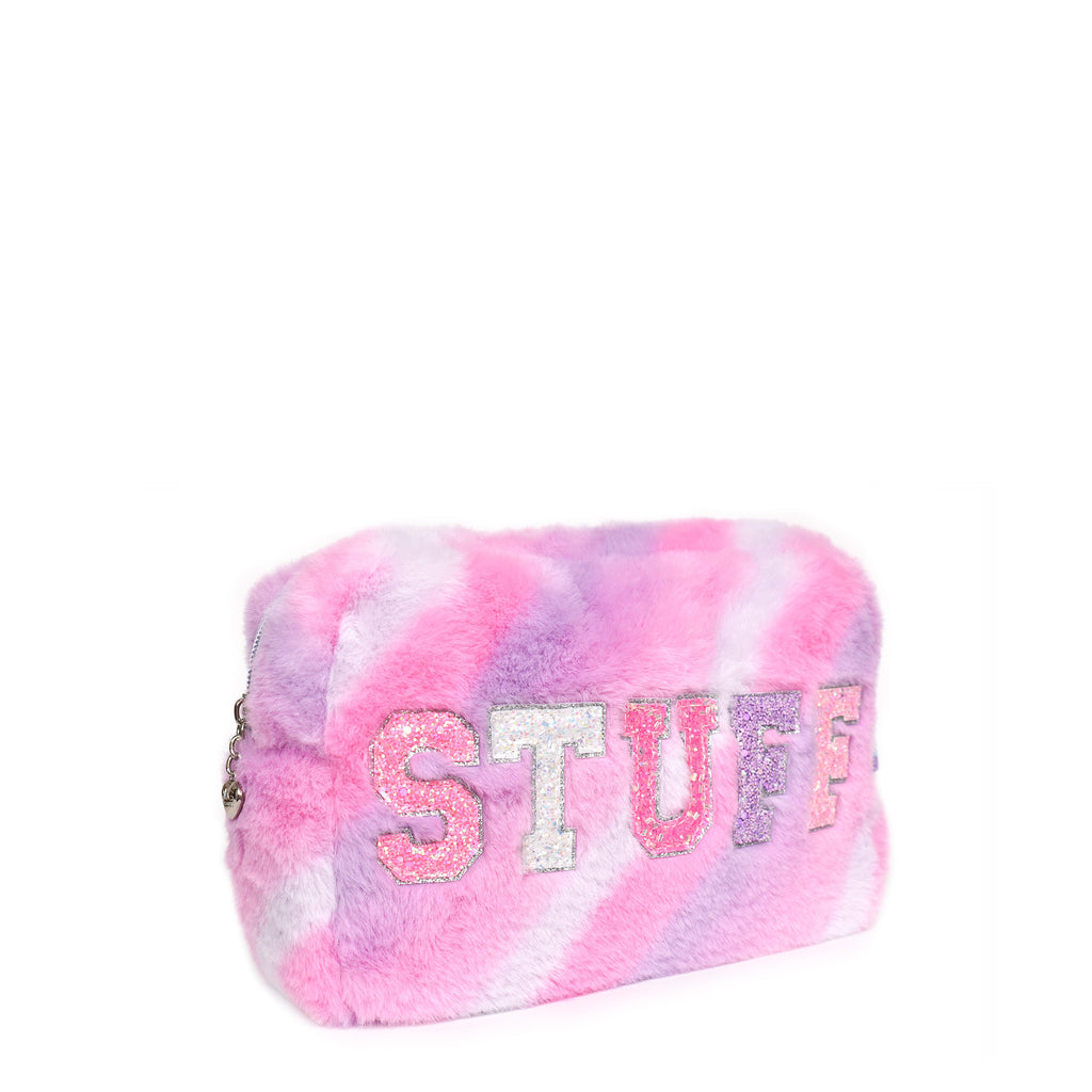 Side view of a pink ombre striped plush pouch with glitter varsity letters 'STUFF'