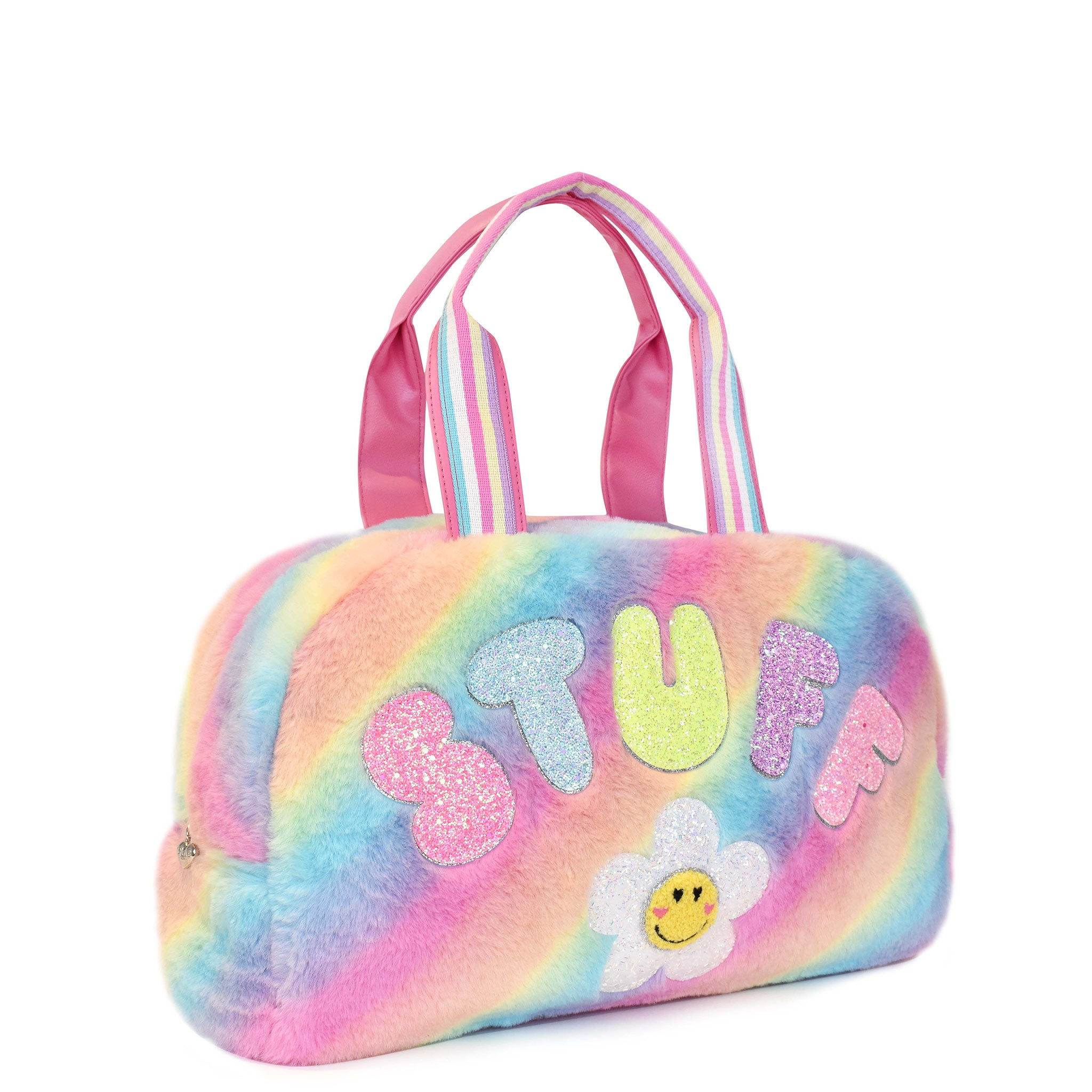 Side view of a rainbow ombre plush medium duffle bag with glitter bubble letters 'Stuff' and a daisy patch applique