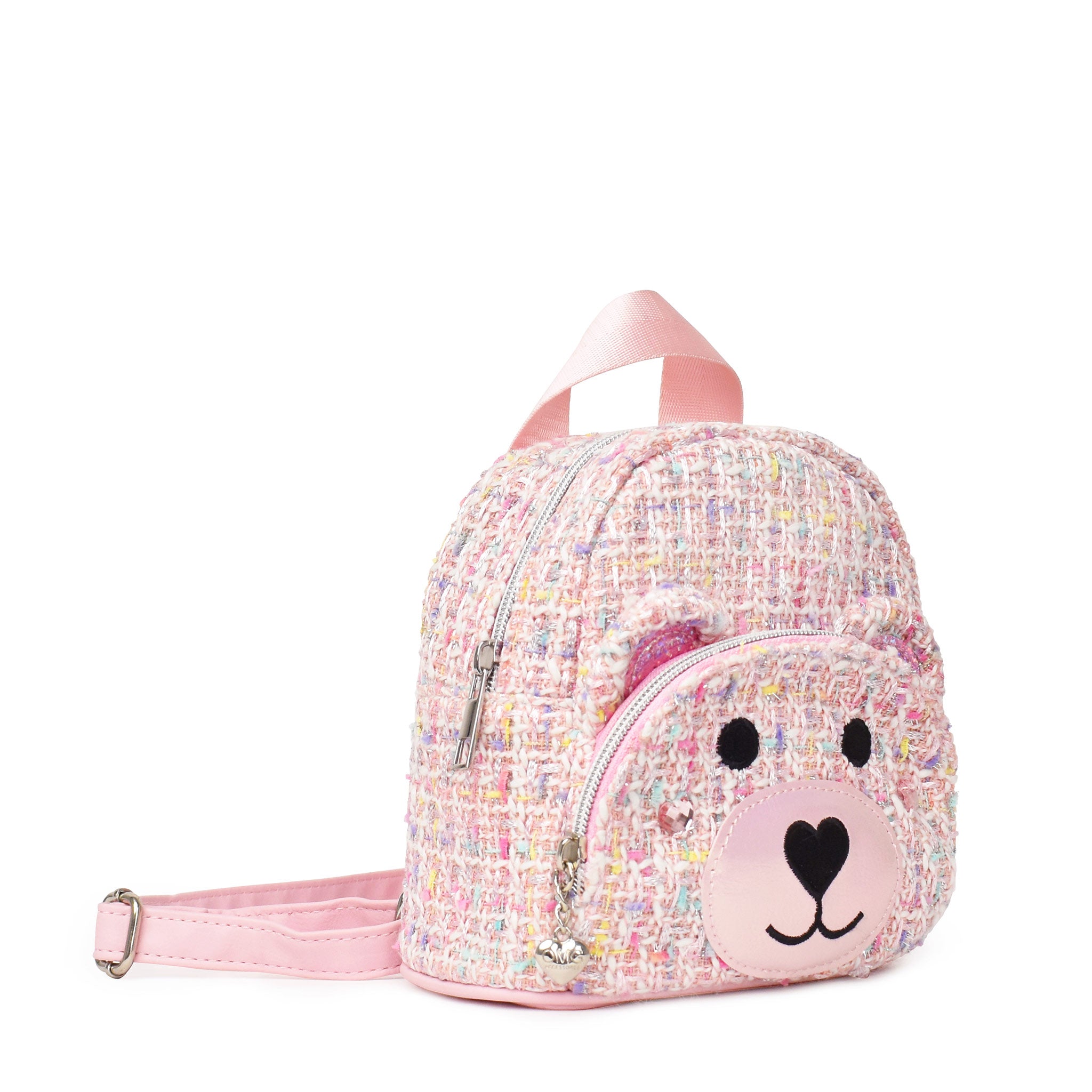 Side view of a pink tweed miniature backpack with a teddy bear face