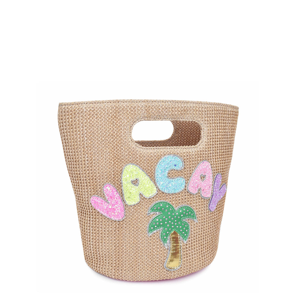 Side view of natural colored straw tote bag embellished with glitter bubble letters 'VACAY' and palm tree appliqués.