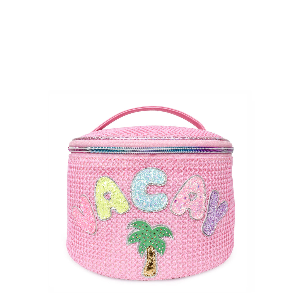 Front view of a pink straw round train case with glitter bubble letters 'VACAY' and palm tree appliqué 