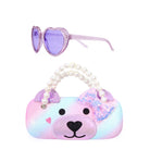 front view of a glitter ombre sunglasses case with a teddy face & pearl beaded handles along with a pair of glitter heart shaped sunglasses