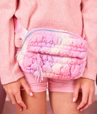 front view of a quilted nylon ombre fanny pack on model